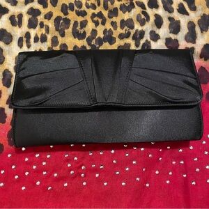 Charming Charlie black satin evening clutch